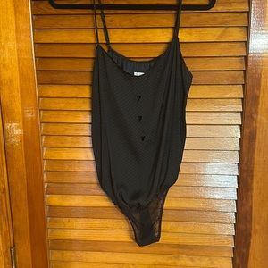 Free people body suit with triangle cut outs